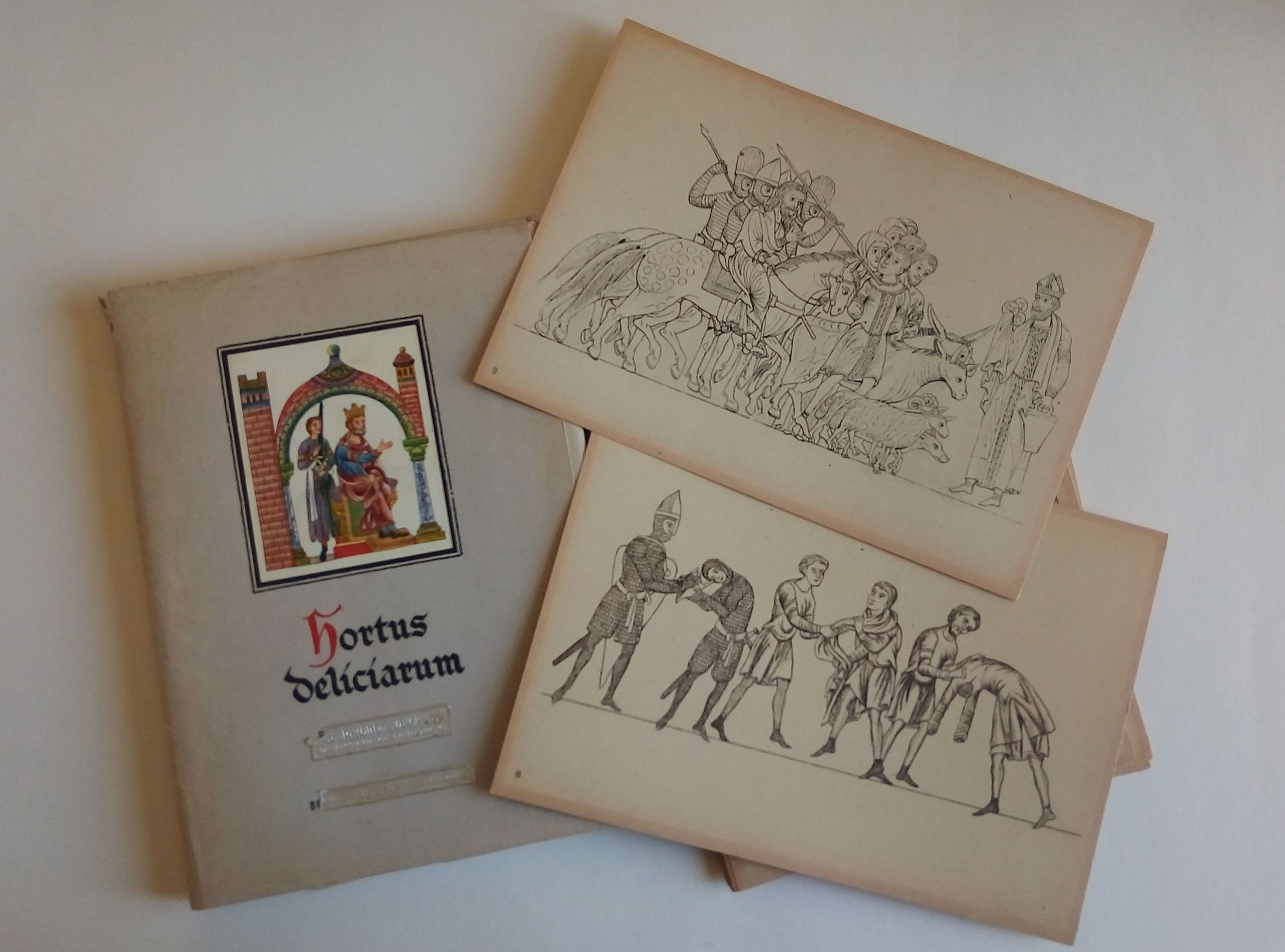 Hortus deliciarum, 1945, Editions Oberlin Couverture et deux planches extraites de l'édition de l'Hortus Deliciarum en 1945 par les Editions Oberlin.
